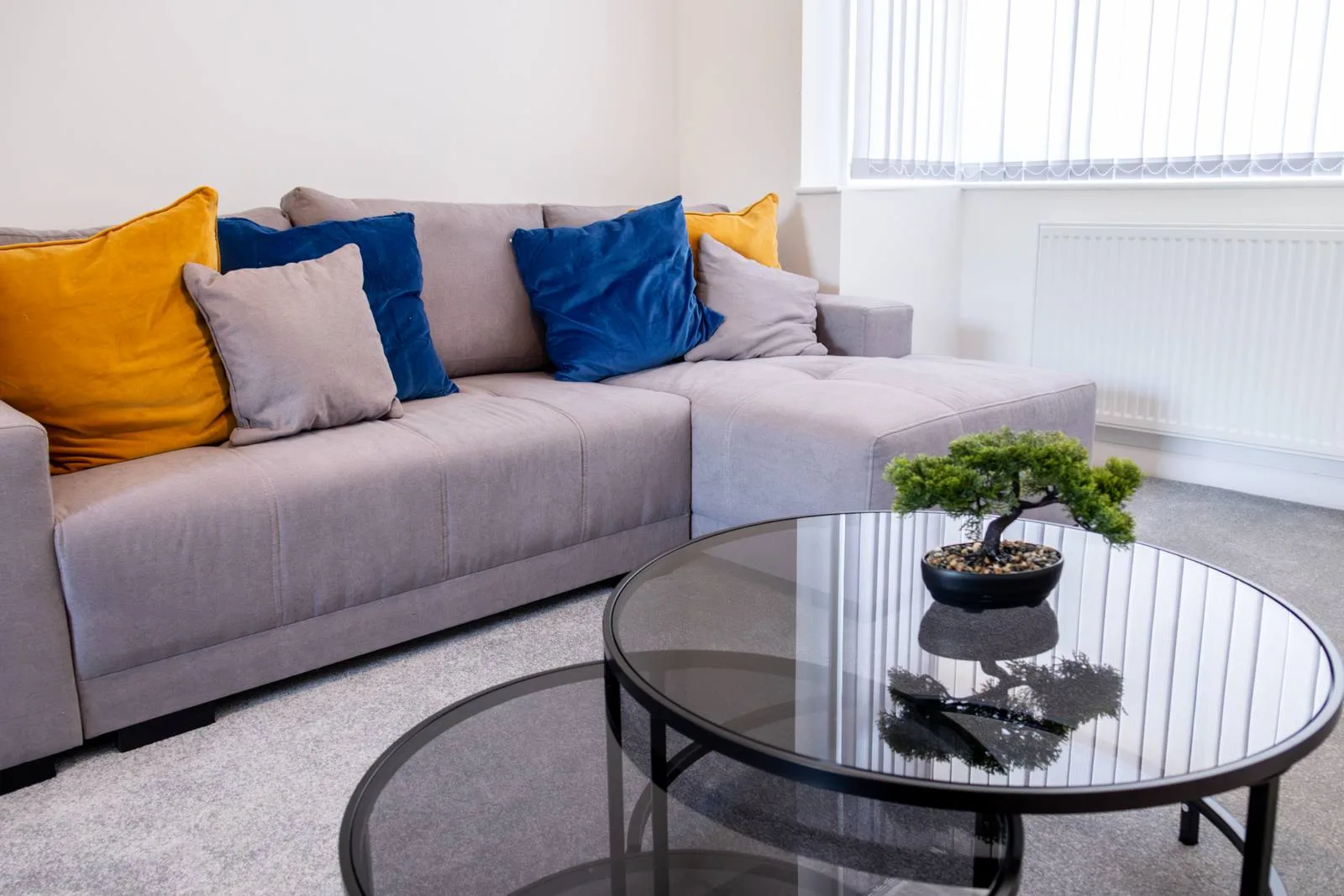 Sullivan Heights Coventry — living room with comfortable corner sofa