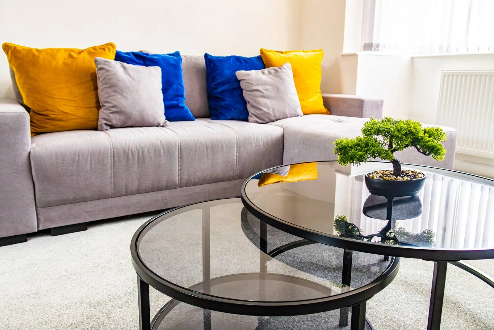 Sullivan Heights Coventry — spacious lounge with sofa and coffee table