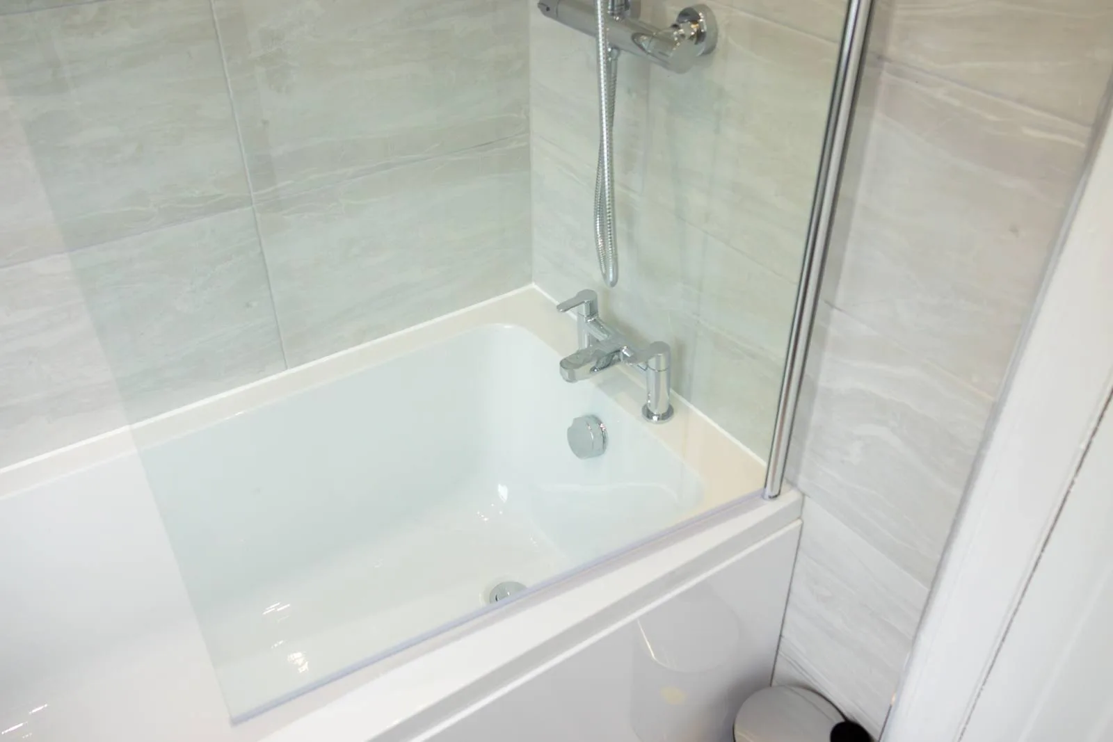 Sullivan Heights Coventry — modern bathroom with bath and shower