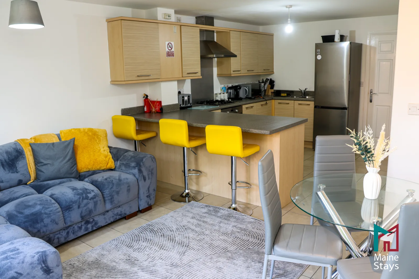 Humber Hub Coventry - Open-plan kitchen, dining and lounge: open plan bar stools